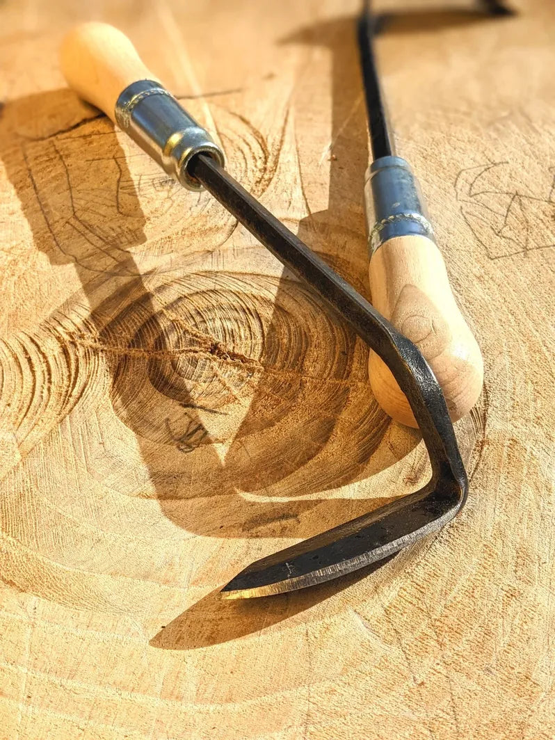 Cape Cod Weeder, right or left handed by Homestead Iron with wooden background