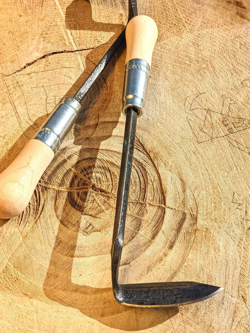 Cape Cod Weeder, right or left handed by Homestead Iron  wooden background deep shadows.