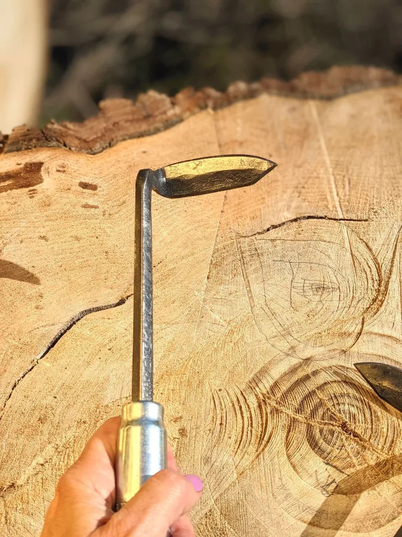 Cape Cod Weeder, right or left handed by Homestead Iron bright sun on tool head and wooden background.