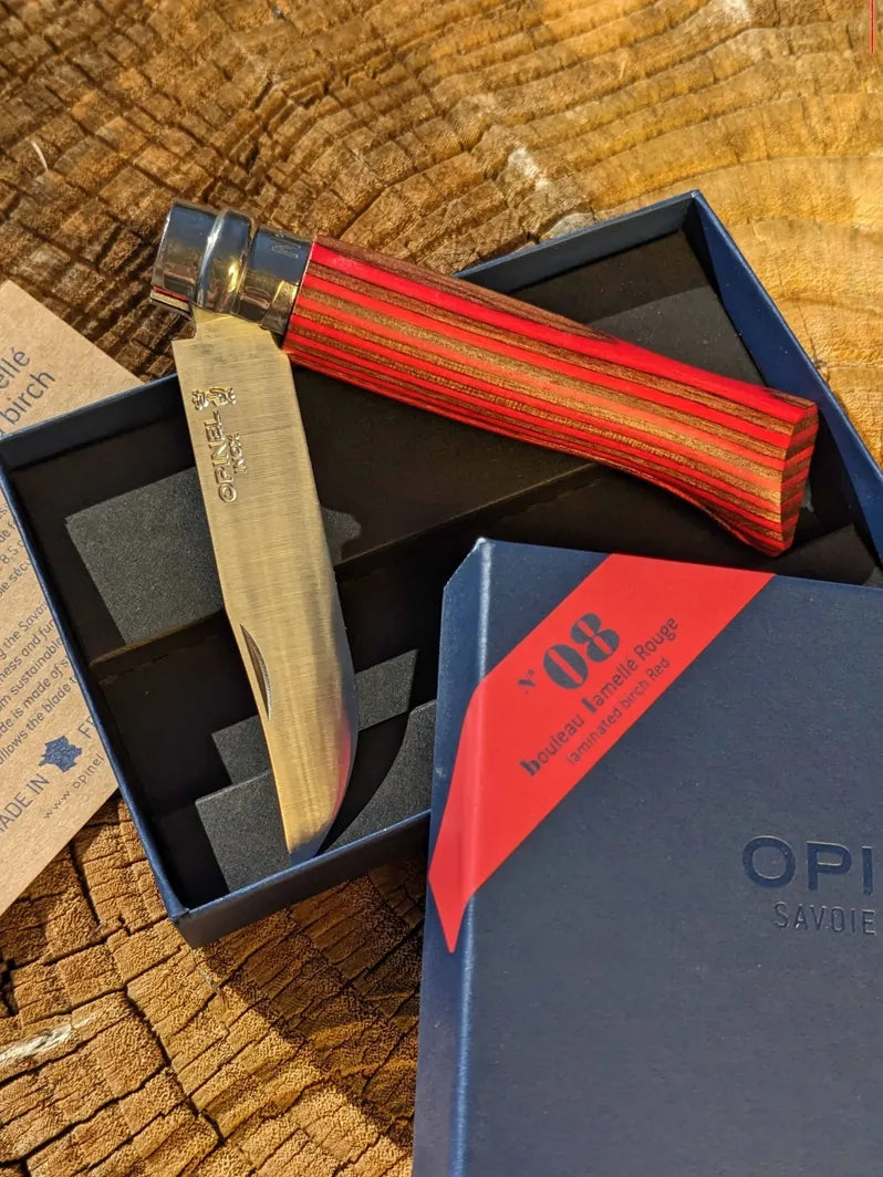 Opinel 8 stainless steel folding pocket knife red hardwood laminate handle on Homestead Iron site.