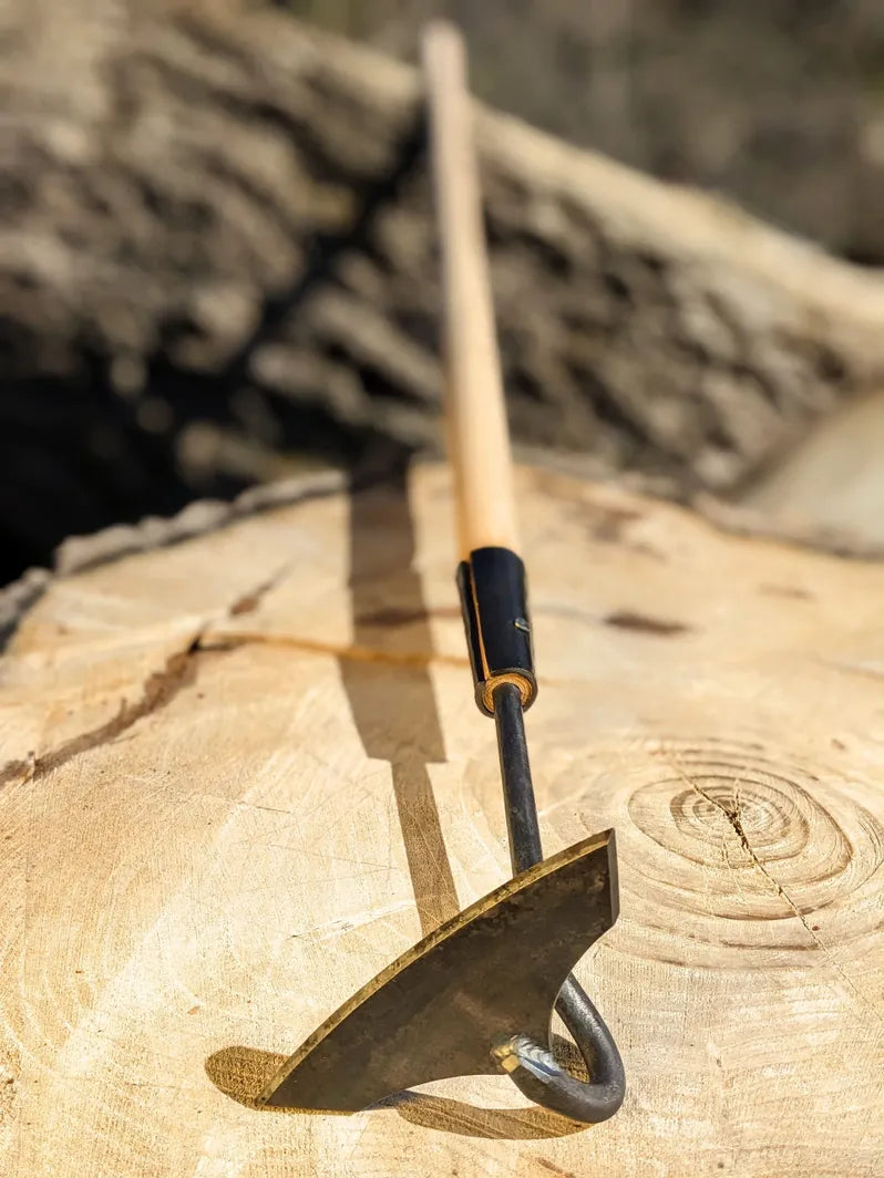 Batwing Hoe, Cotton Hoe, Long Handle Tool Hand Forged with focus on tool head on wooden background 