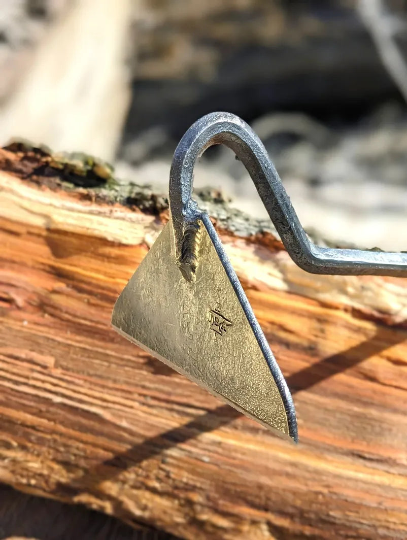 Classic Hoe Hand Forged Garden Tool Homestead Iron focus on tool head. 
