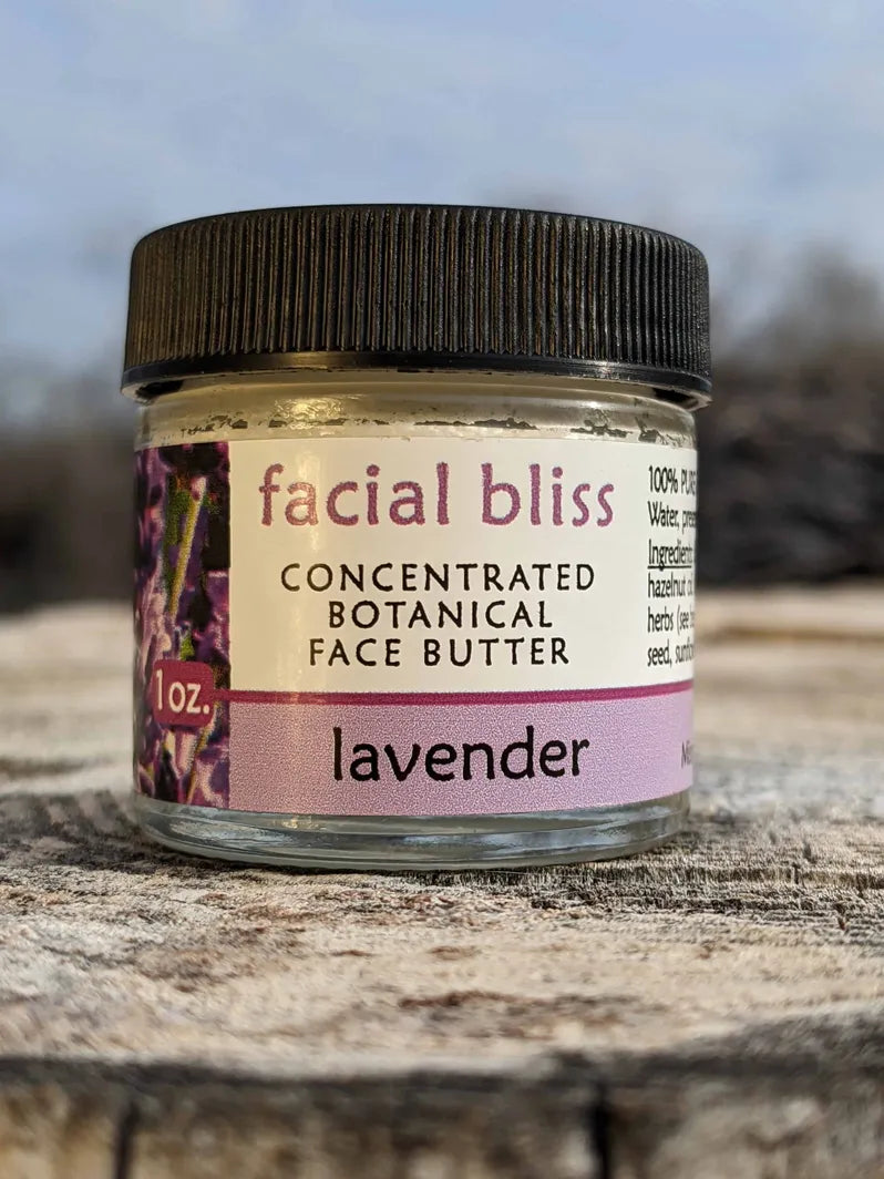 Facial Bliss, Lavender ~ All natural face butter Missouri Herbs with blue sky background. 