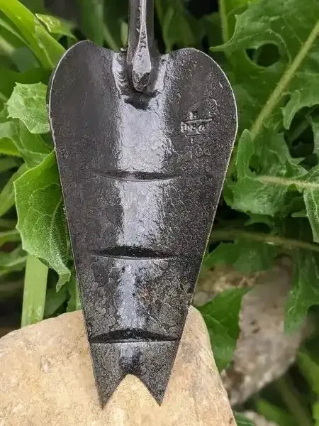 Multi-Purpose Trowel, Hand Forged Garden Tool by Homestead Iron close up  chisel tip. 