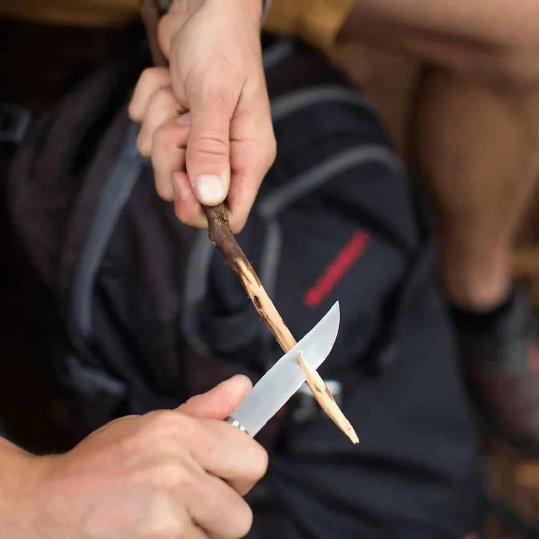 Whitling with an Opinel #8 Carbon folding knife on Homestead Iron site.
