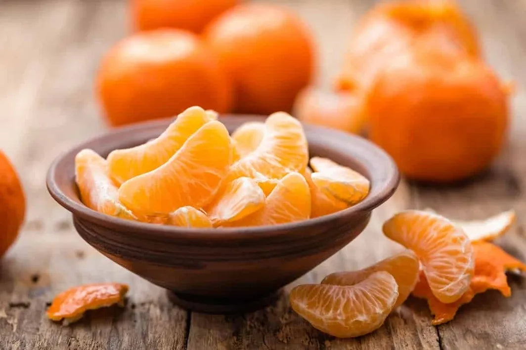 Bowl of tangerine slices by Missouri Herbs. 