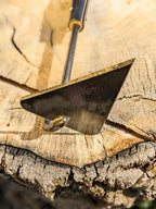 V-Hoe Aggressive Long Handled Hand Forged Hoe Homestead Iron focus on tool head. 