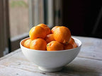 Bowl of tangerines by Missouri Herbs. 